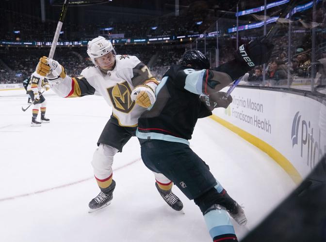 Vegas Golden Knights defenseman Alec Martinez, center, celebrates his goal  with center Jack Eichel, left, left wing William Carrier, second right, and  defenseman Alex Pietrangelo (7) during the second period in Game