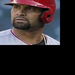 Slumping slugger Pujols cut by Angels, still wants to play