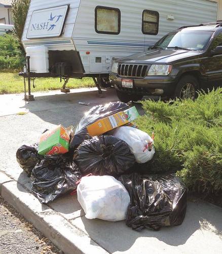 Why You Should Avoid Having Overflowing Garbage Bins - Sweitzer Waste