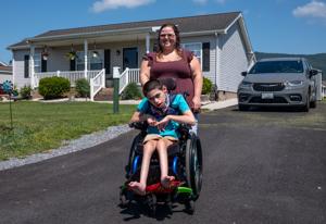 McGaheysville Ruritans, others make driveway wheelchair-accessible for 14-year-old boy