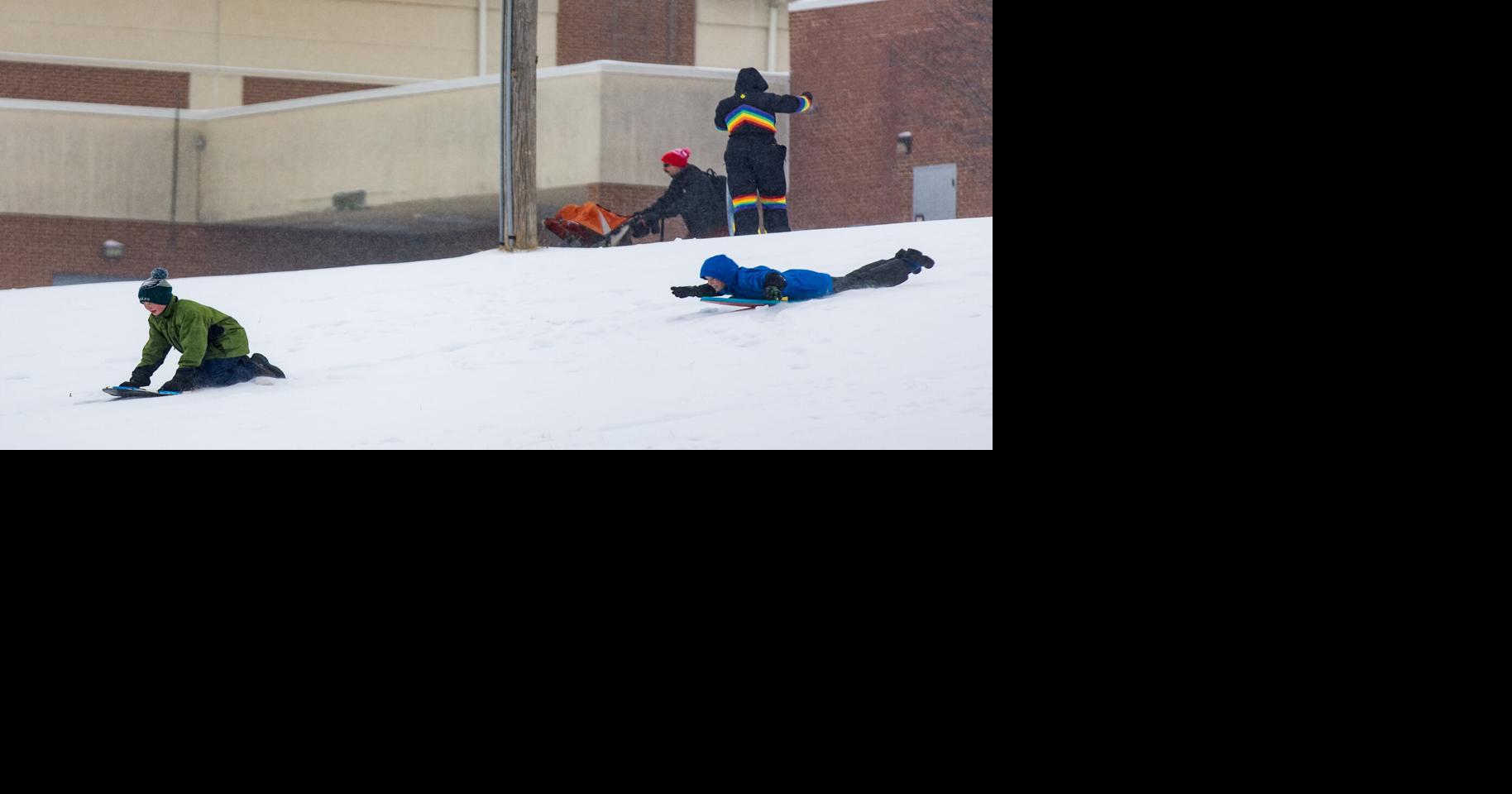 Snow, cold prompting school closures Monday