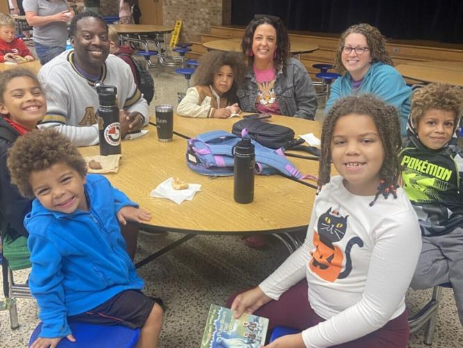 Stone Spring Elementary School provides donuts and books for students
