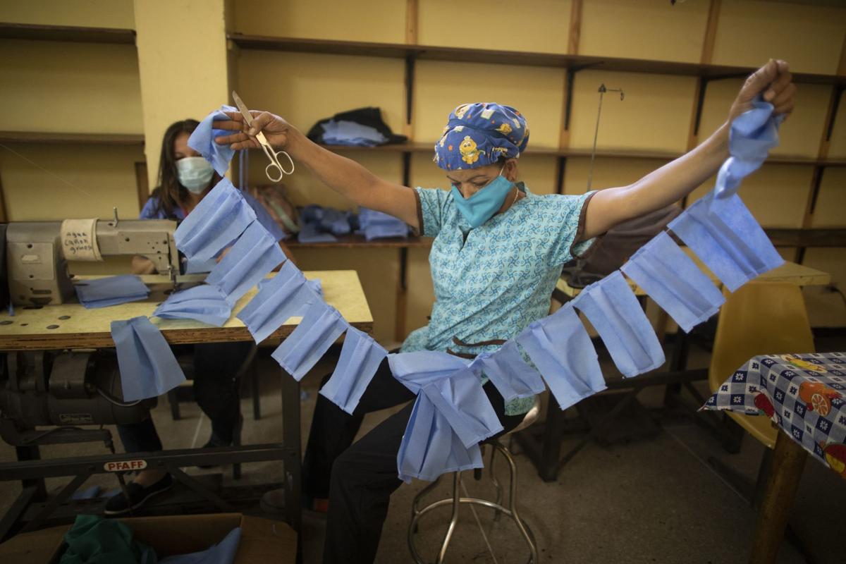 APTOPIX Virus Outbreak Venezuela Masks