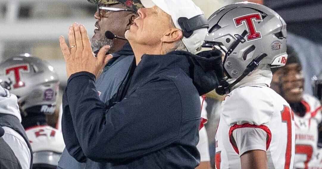 Thompson coach Mark Freeman reflects in the victory late iun the game against Opelika during the AHSAA Super 7 Class 7A football state championship at Protective Stadium in Birmingham, Ala., Wednesday, Dec. 3, 2025.
