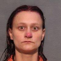 Mother accused of leaving dead infant in freezer pleads not guilty