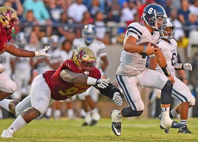 4 Wiregrass Defensive Linemen Rush To Sign Early High