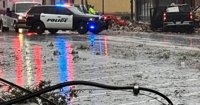 What authorities are calling a "possible tornado" hit downtown Geneva Sunday.