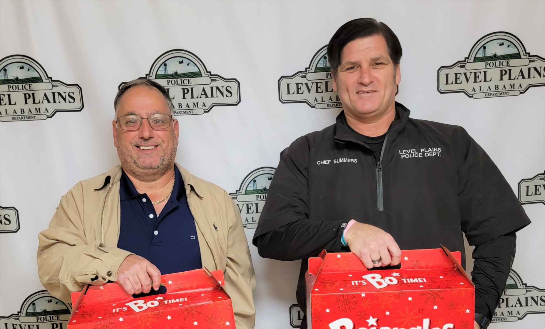 Level Plains Mayor, Chief Make Christmas Eve Deliveries