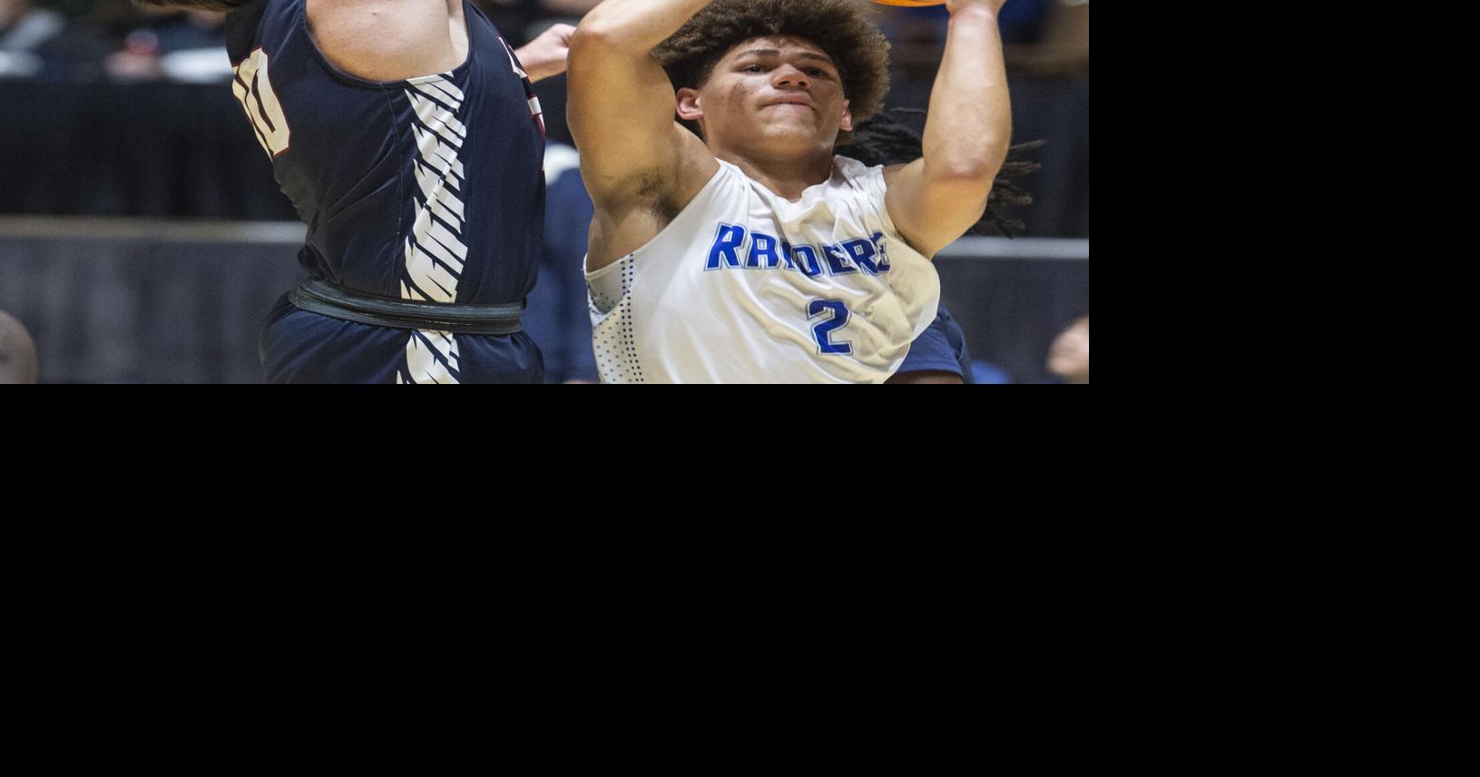DothanEagle.com - Mitchell's acrobatic shot pushes Raiders to regional finals; HA girls fall image