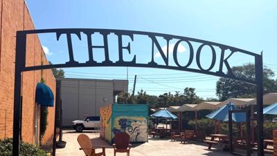 Downtown Enterprise businesses shine with new blade signs grant