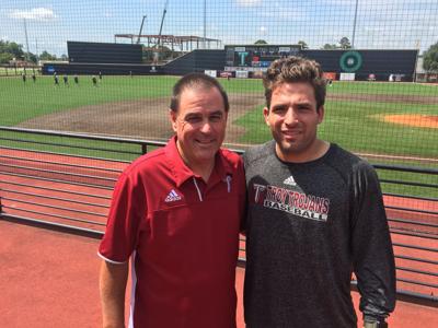 coach son father troy catcher baseball smartt university dothaneagle chase trojans starting past mark head left his