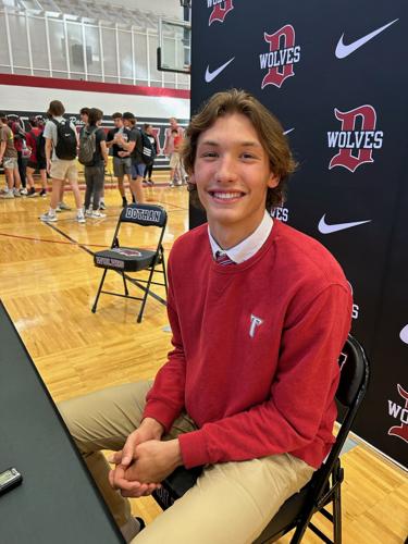 Dothan Wolves basketball player Thomas Dowd signs with Troy University