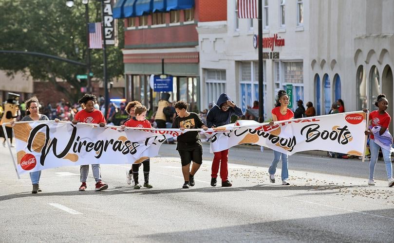 Thousands line National Peanut Festival parade route