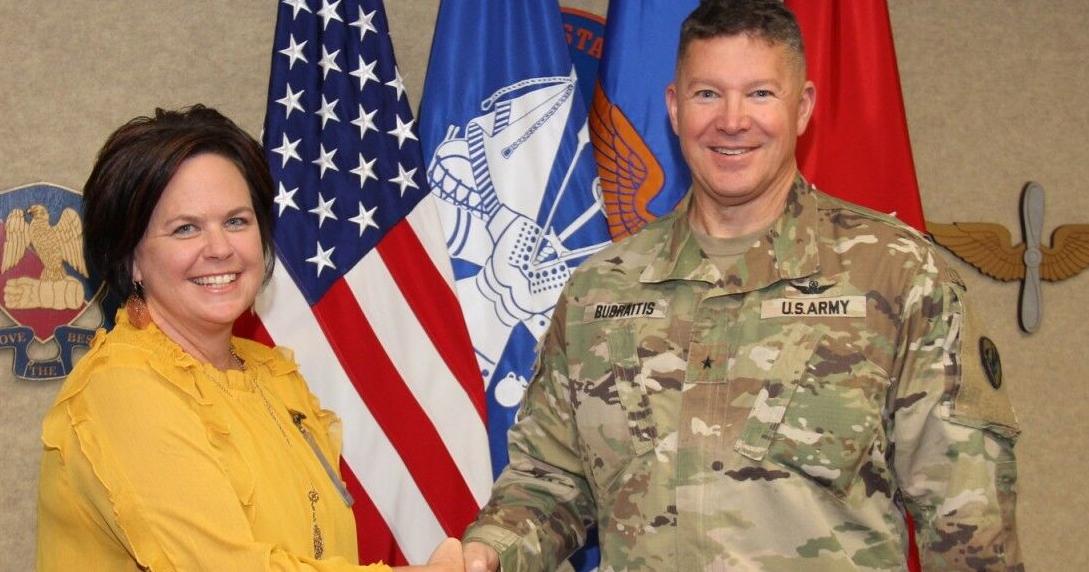 TRADOC CG honors Fort Rucker family advocacy program employee