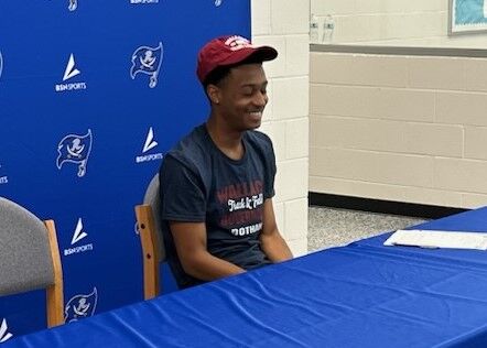 Rehobeth's Douglas signs with Wallace cross country