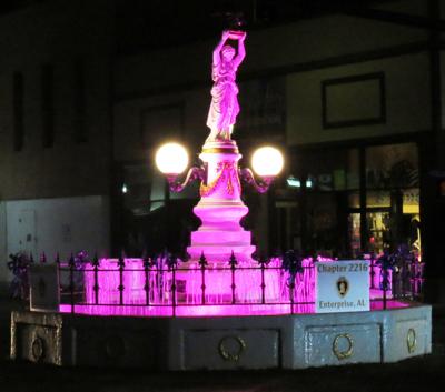 Boll Weevil Monument turns purple on Purple Heart Day