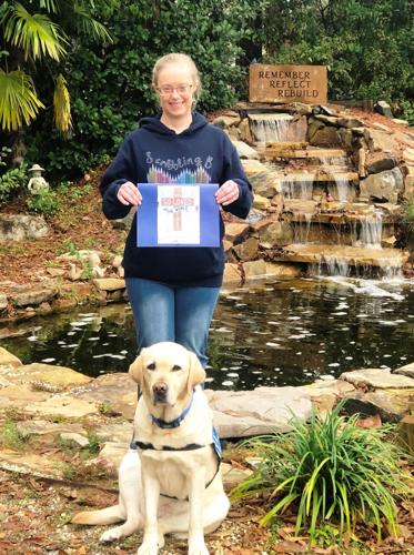 Local Special Olympian makes calendars to raise money for Angel Paws program