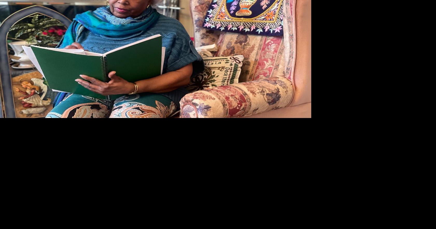 Jamiese Mims Fuller, a retired Birmingham teacher, reviews her students' progress at her home after working a shift as a tutor at a nearby school. Fuller is one of many retired educators who said they work part-time to keep up with rising costs of living.