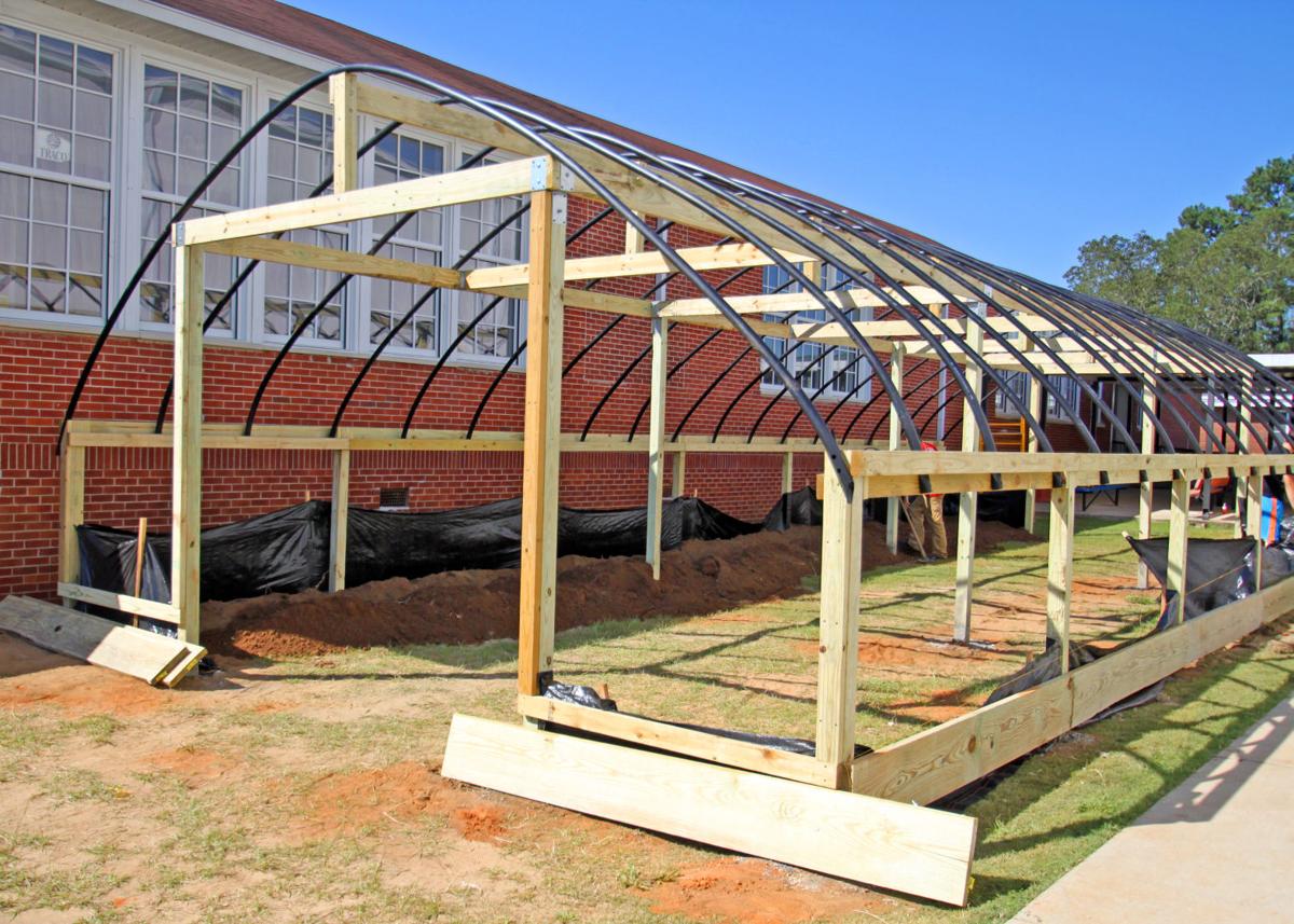 Kinston students build first school tunnel house in Coffee County