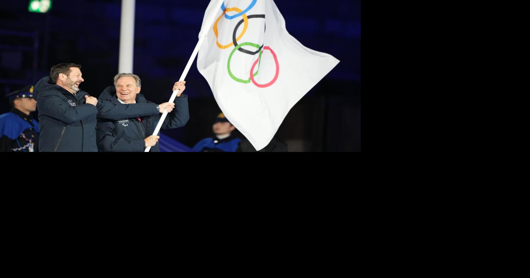 Twin Milan and Cortina Olympic cauldrons are extinguished, signaling the end of Winter Games