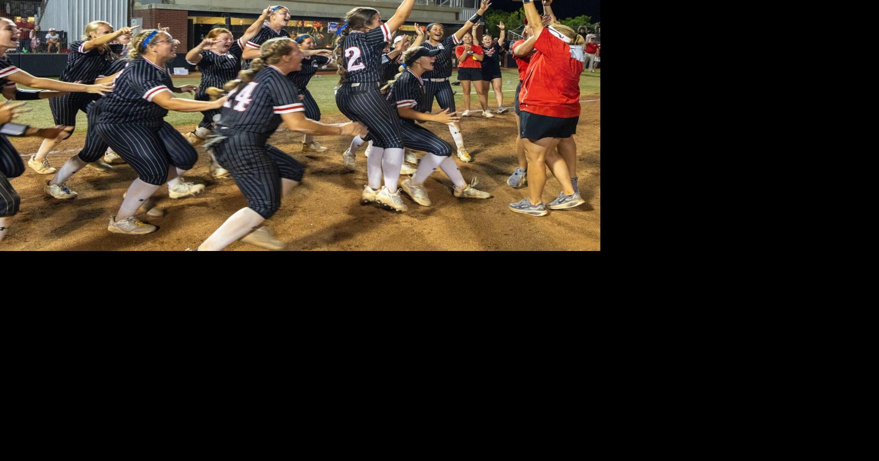 Saraland races to the championship trophy during the AHSAA Class 6A softball state championship at Choccolocco Park in Oxford, Ala., Tuesday, May 19, 2026.