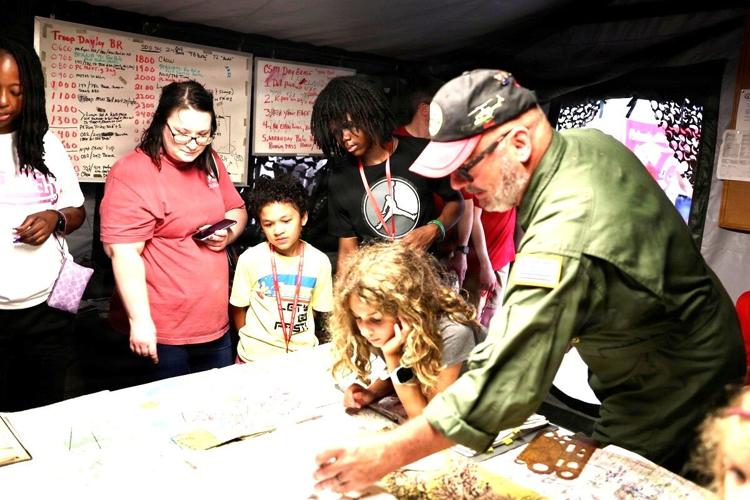 Gold Star families explore aviation heritage at interactive FOAA event