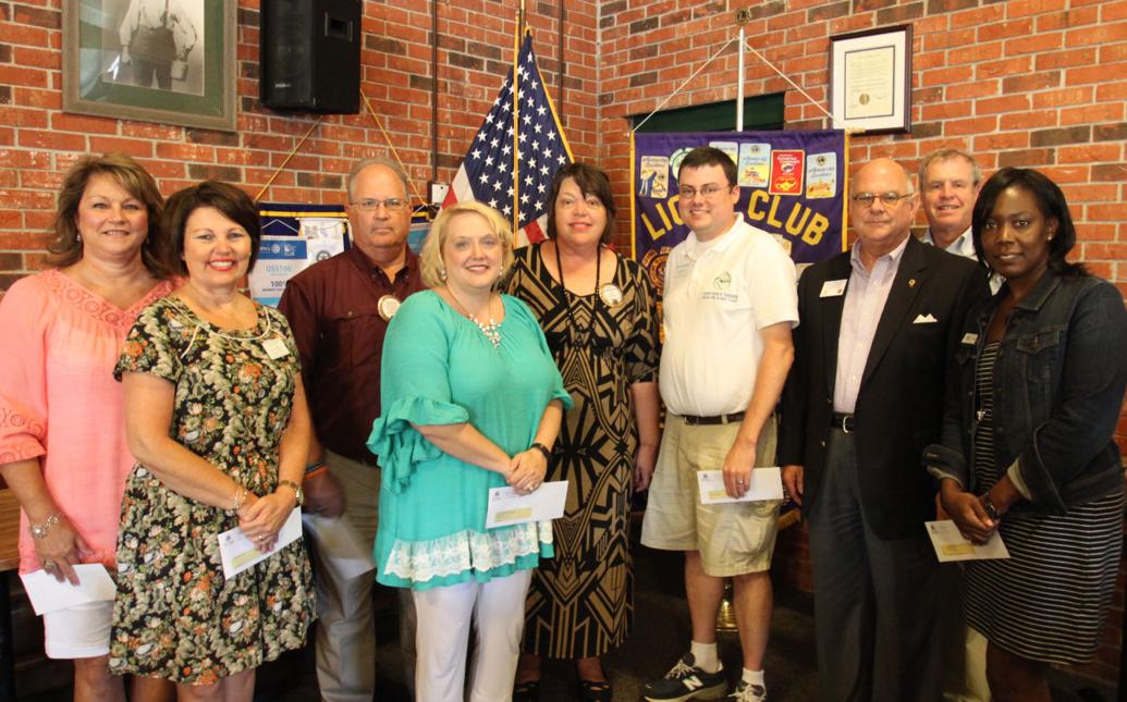 Local Lions Club donates money, appoints new president