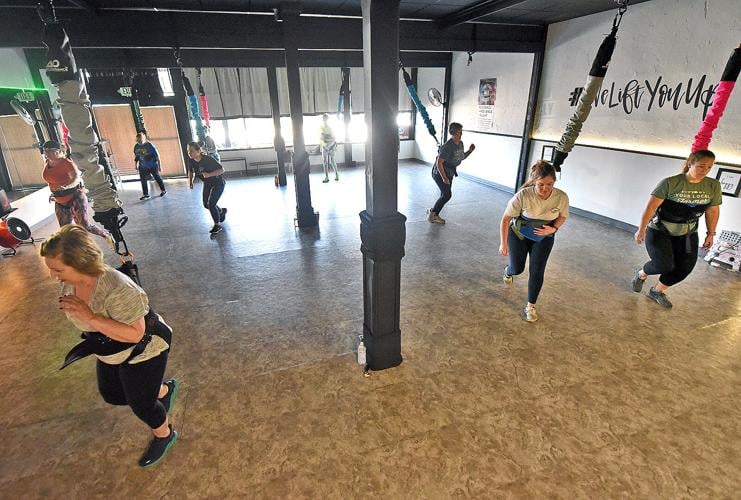 Aerial bungee class delivers tough workout with low-impact moves