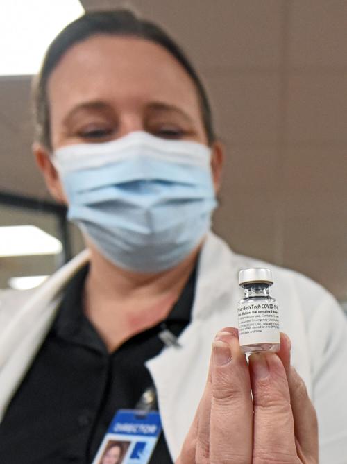 Vaccinations continue as local hospitalizations reach new record high