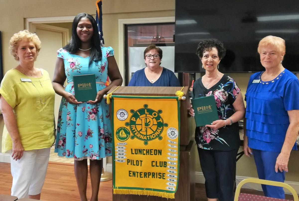 Luncheon Pilot Club installs two new members
