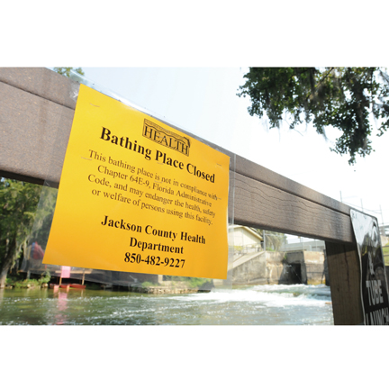 Spring Creek was closed to visitors Monday because of potential contamination after a sewer line broke and sent effluent into the Chipola River and creek Sunday.