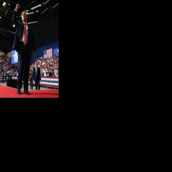 US President Donald Trump greets supporters at an October 2026 rally in Kansas -- a state he will return to on the last weekend of the midterm election campaign after initially canceling the visit