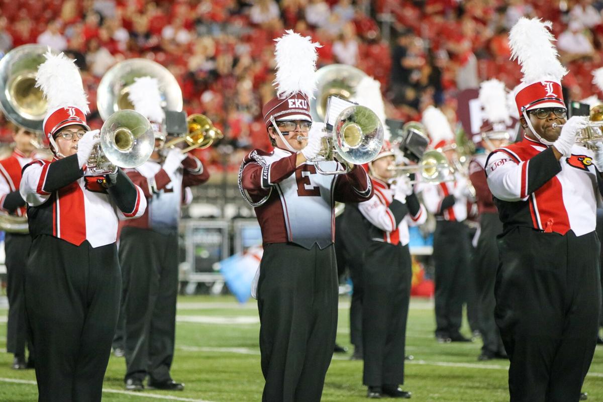 PHOTOS: Marching Colonels join Marching Cardinals for halftime performance