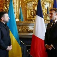 Ukrainian leader Volodymyr Zelensky met French President Emmanuel Macron after arriving in Paris for a meeting of Kyiv's allies
