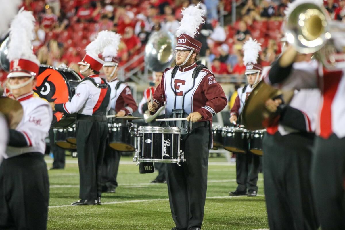 PHOTOS: Marching Colonels join Marching Cardinals for halftime performance