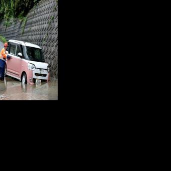 Two severe tropical storms are expected to converge over Japan, making forecasting their movements and strengths more difficult
