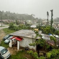 This picture shows a general view of a residential area as rain falls ahead of the arrival of the forecasted Super Typhoon Bavi in Saipan, Northern Mariana Islands