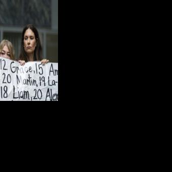 Outside court, activists held a banner with the names of nearly 400 young people whose deaths were allegedly connected to their social media use