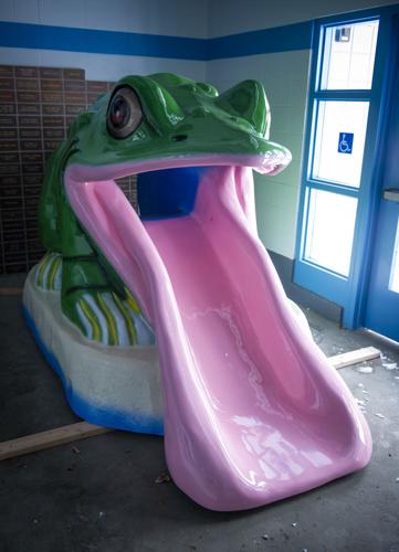 pink dog riding on a giant frog - Playground