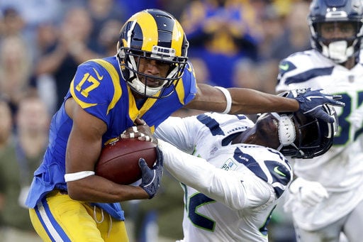 Rams WR Cooper Kupp carted off after horse-collar tackle, but