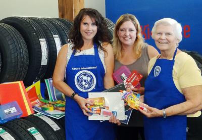 Tire store collects back to school donations