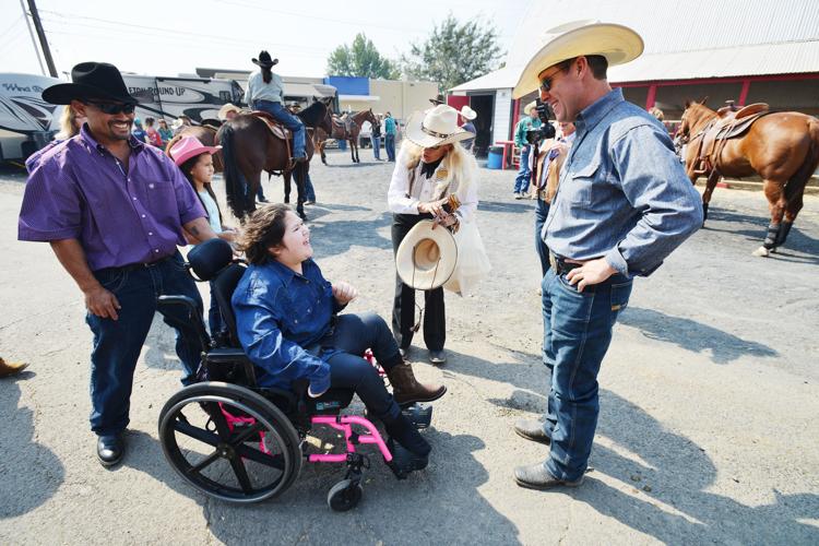 Local girl meets Trevor Brazile, gets Western gifts, Local News