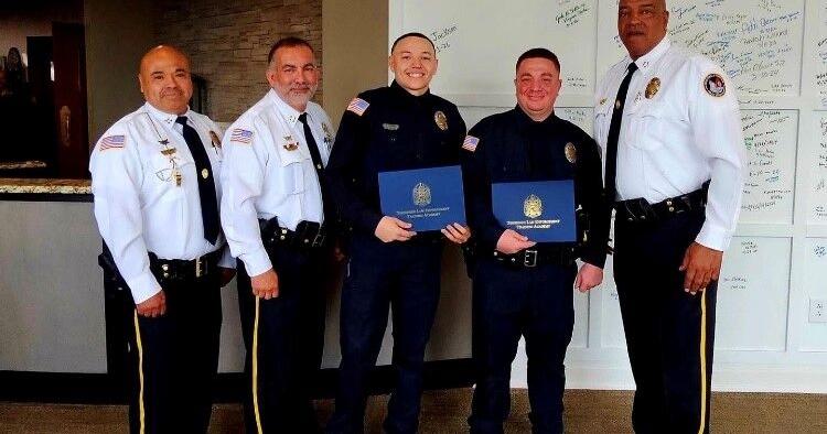 2 patrolmen graduate law enforcement academy