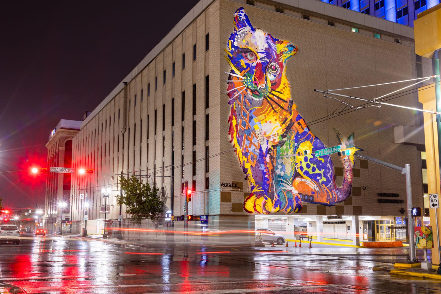 Portuguese artist crafts trash into 64-foot mountain lion mural in 