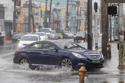 Bajo advertencia de inundaciones varios municipios de la Isla