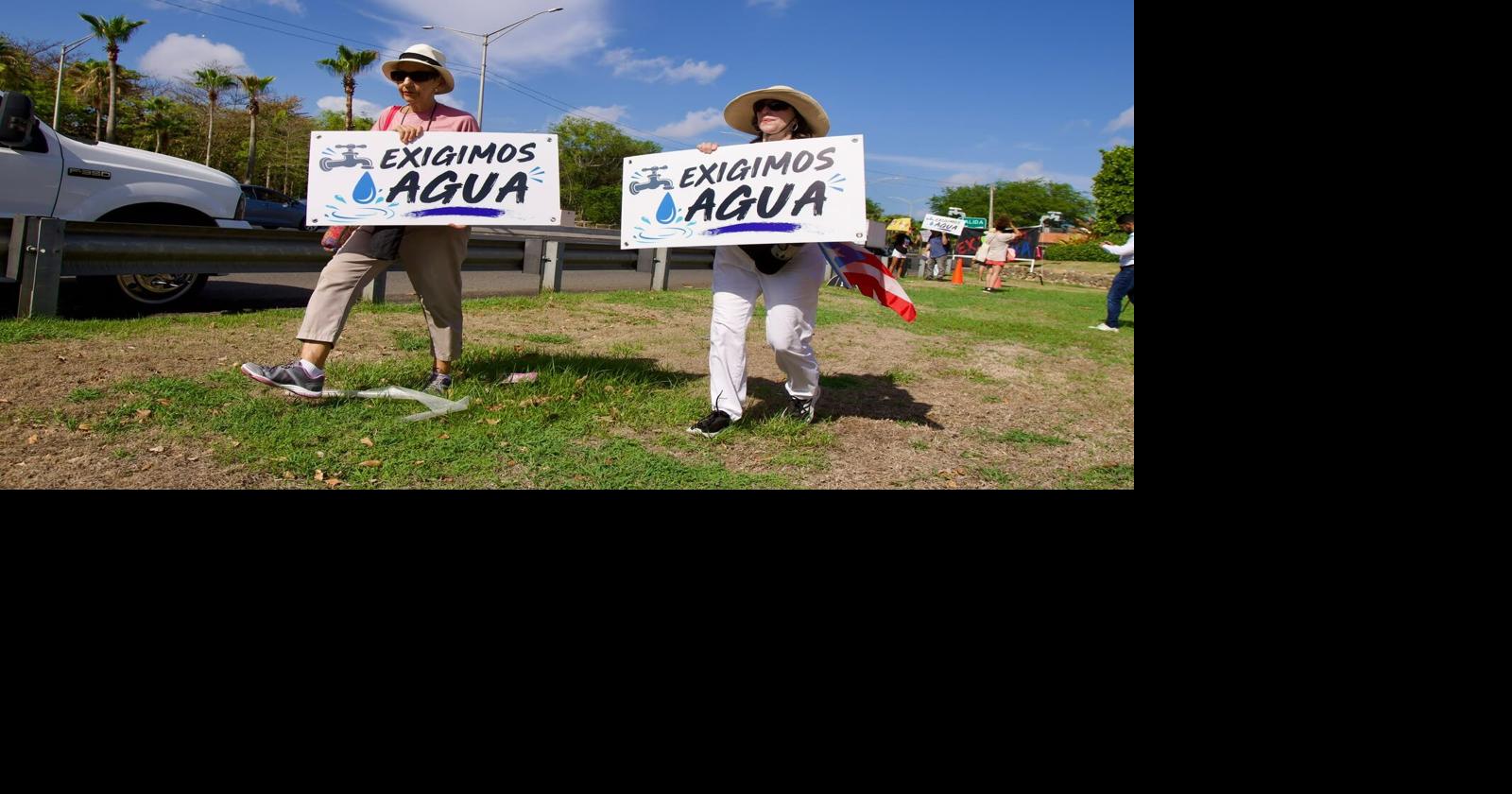 (FOTOS) "El agua es transparente y nos pertenece a todos": Comunidades reclaman acción de la AAA por crisis de agua