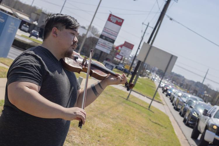 Tyler street musician captivates through violin freestyle performances | Calendar Culture |