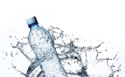 plastic bottle in water splash