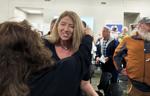 Molly Brooks embraces Suzanne