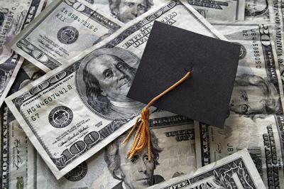 Graduation cap on assorted money